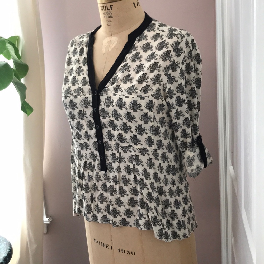Wise Owl hi-lo peplum blouse.